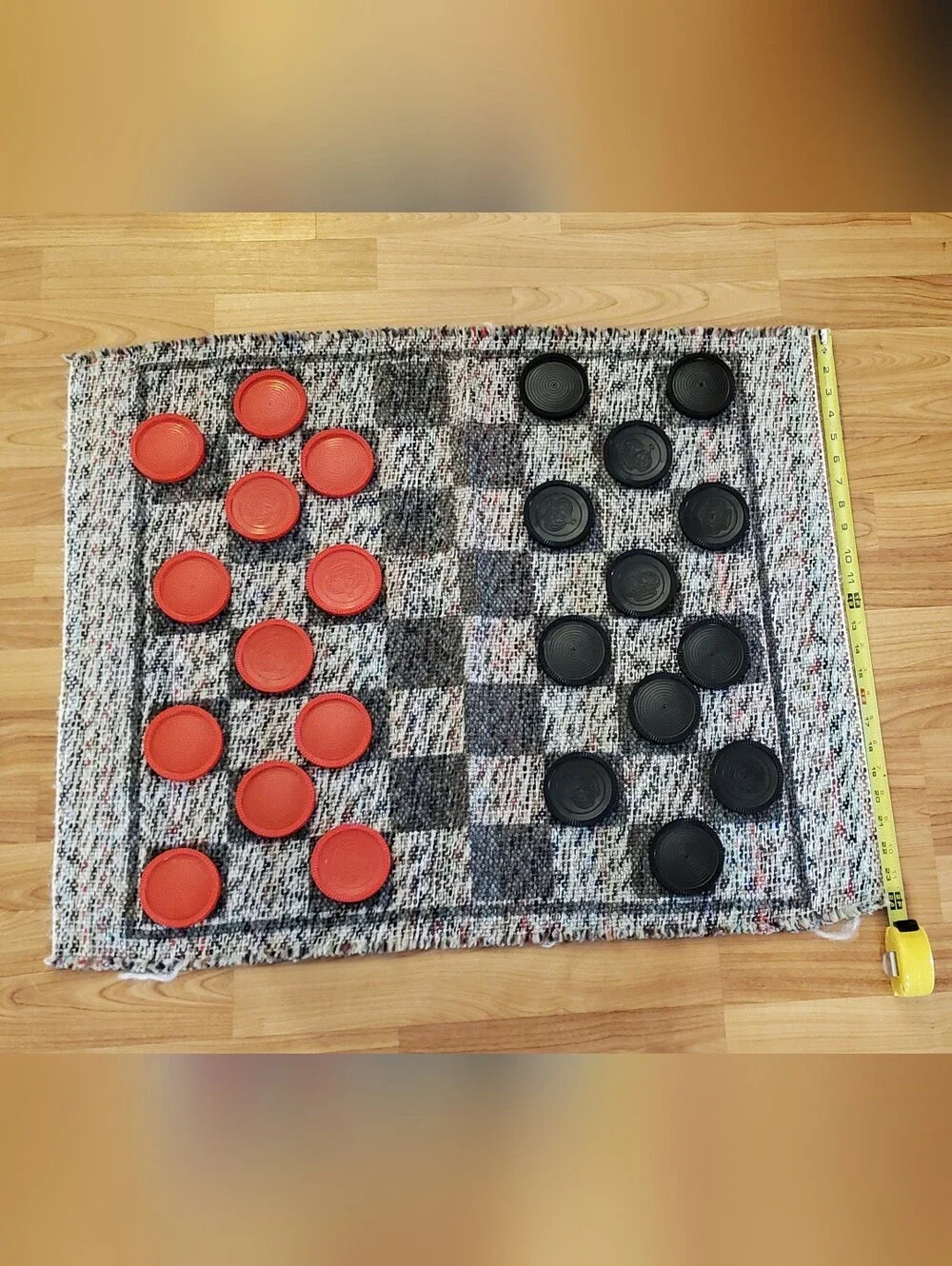 Handwoven Checkered Game Mat with Red and Black Checkers